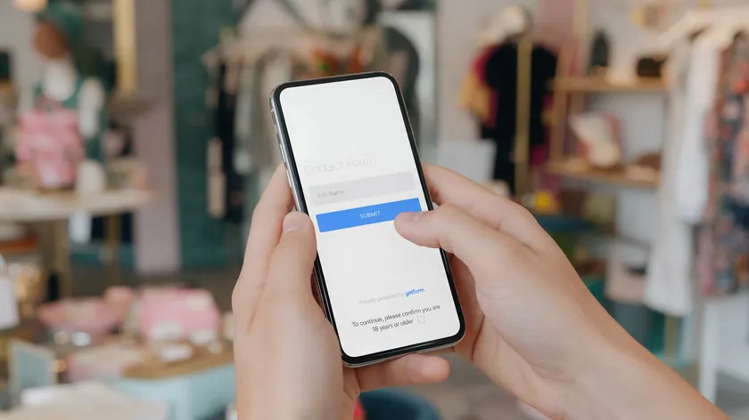 Customer filling out a structured lead-capture form on a phone inside a WhatsApp conversation.